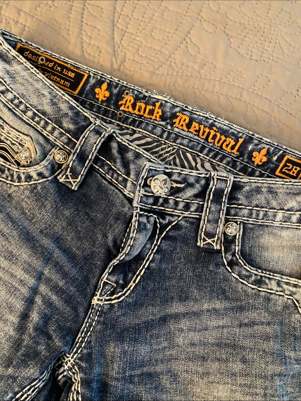 Rock Revival women’s Faded Blue Slim Straight Jeans with Contrast Stitching